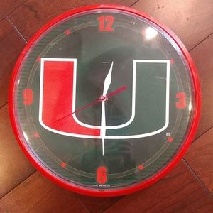 Miami Huricanes the U Plastic Wall Clock - Orange & Green - Football